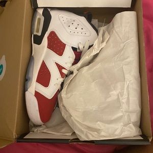 I am selling the Jordan’s (Carmines) size 6Y
